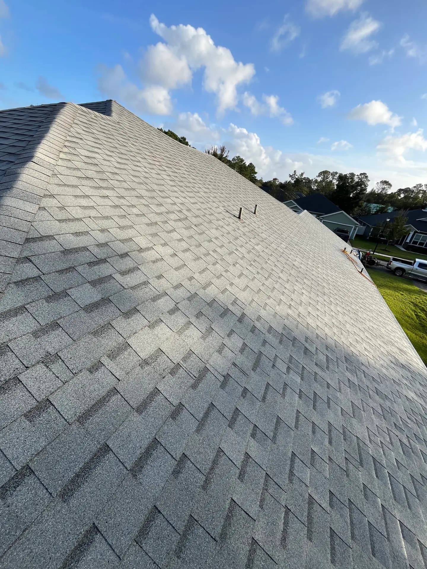 Shingle roof soft washed by Jax Softwash Pros